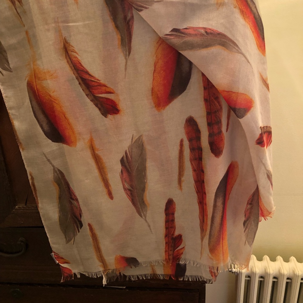 Fall feather scarf with taupe background